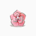 A 14K rose gold ring by Effy features a conch shell design accented with diamonds, displayed on a white background.