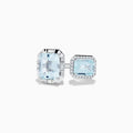 The 14K White Gold Double Aquamarine Ring features two light blue stones—one encircled by diamonds in a halo setting and the other set in a minimal geometric design.