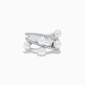 The 14K White Gold Fresh Water Pearl and Diamond Ring features three crisscrossing bands, each set with sparkling diamonds and five elegant freshwater pearls arranged along the bands.