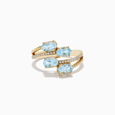 The Aquarius 14K Yellow Gold Aquamarine and Diamond Bypass Ring features two overlapping bands with sparkling diamonds and four diagonally set oval aquamarines.