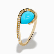 The Terra 14K Yellow Gold Turquoise and Diamond Ring showcases an asymmetrical turquoise stone and a curved band with small white diamonds, set against a white background.