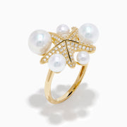 The 14K Yellow Gold Pearl and Diamond Starfish Ring showcases five large white pearls of varying sizes and a sparkling diamond starfish design.