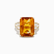 The Sunset 14K Yellow Gold Citrine and Diamond Cocktail Ring showcases a large rectangular citrine at the center, flanked by sparkling diamonds on both sides of the band, displayed on a white background.