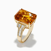 The Sunset 14K Yellow Gold Citrine and Diamond Cocktail Ring showcases a large rectangular citrine at the center, flanked by sparkling diamonds on both sides of the band, displayed on a white background.