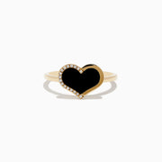 The Eclipse 14K Yellow Gold Onyx and Diamond Heart Ring features a heart-shaped black onyx centerpiece outlined with diamonds, displayed on a plain white background.