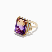 The 14K Yellow Gold Ametrine and Diamond Ring features a large rectangular ametrine with amber and purple hues, accented by small diamonds and geometric diamond details on the band, all set against a white background.