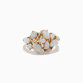 The Aurora 14K Yellow Gold Opal and Diamond Ring features oval and round opals accented with sparkling diamonds, displayed on a white background—a stunning choice for any occasion.