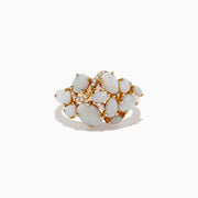 The Aurora 14K Yellow Gold Opal and Diamond Ring features oval and round opals accented with sparkling diamonds, displayed on a white background—a stunning choice for any occasion.