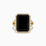 The 14K Yellow Gold Onyx and Diamond Ring showcases a large rectangular onyx bordered by sparkling white diamonds, with extra diamond accents along the elegant split band.