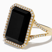 The 14K Yellow Gold Onyx and Diamond Ring showcases a large rectangular onyx bordered by sparkling white diamonds, with extra diamond accents along the elegant split band.