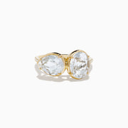 The 14K Yellow Gold White Topaz and Diamond Ring showcases two large, oval-cut white topaz stones set side by side in a minimalist, elegant style on a white background.