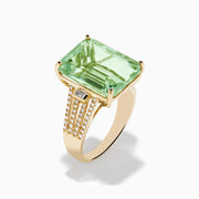 The 14K Yellow Gold Green Amethyst and Diamond Ring showcases a large rectangular green amethyst at the center, with smaller diamonds on the sides and pave-set diamond accents along the band.