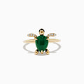 The Seaside 14K Yellow Gold Malachite and Diamond Turtle Ring features a malachite shell and diamond-accented front flippers, beautifully displayed against a plain white background.