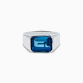 The Mens Ocean Bleu 925 Sterling Silver London Blue Topaz Ring features a large, emerald-cut rectangular gemstone set in the center, showcased against a plain white background.