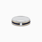 The 925 Mens Sterling Silver Sapphire Ring features a two-tone design with white and yellow metal accents, a central square diamond, and a channel-set row of square blue sapphires along the band.