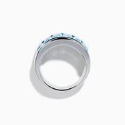 The Ocean Bleu 925 Sterling Silver Blue Topaz Ring features seven rectangular blue topaz gemstones set in a row across the front.