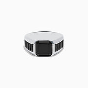 The Mens 925 Sterling Silver Black Spinel Ring showcases a large square-cut black spinel at its center, accented with smaller rectangular stones on each side of the band. Displayed on a white background, its a sophisticated choice for men.