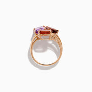 The 14K Rose Gold Pink Amethyst, Tourmaline & Rhodolite Cocktail Ring showcases a pink amethyst, deep red tourmaline, and faceted purple rhodolite in delicate prongs for a stunning cocktail look.