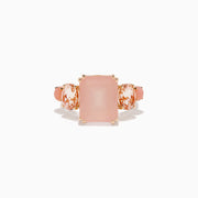 The 14K Rose Gold Pink Rose Quartz, Pink Opal and Morganite Ring features a large rectangular pink quartz center, flanked by two oval pink opals on a simple band, shown against a white background.