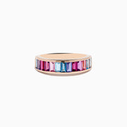 The 14K Rose Gold Multi Color Gemstone Band Ring showcases rectangular gemstones in blue, pink, and purple gradient shades set in a continuous row around the band.