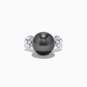 The 14K White Gold Tahitian Pearl and Diamond Ring showcases a large round Tahitian pearl at the center, accented by sparkling diamonds on each side, all set against a plain white background.