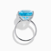 The Ocean Bleu 14K White Gold Sky Blue Topaz Ring features a large cushion-cut gemstone, showcased against a plain white background.