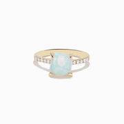 The Aurora 14K Yellow Gold Opal and Diamond Ring features a rectangular opal center accented by small round diamonds along the band, shown against a white background.