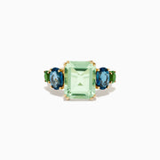 The 14K Yellow Gold Amethyst, Blue Topaz, and Chrome Diopside Cocktail Ring features a large rectangular amethyst center stone, flanked by two oval blue topaz and two smaller chrome diopside stones on each side.