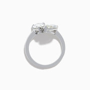 The Lab Grown Diamond Toi Et Moi Ring in 14K White Gold features two striking clear diamonds—a pear-shaped and a marquise-cut—set on open ends of the band, shown against a plain white background.