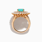 The Effy Hematian 18K Rose Gold Paraiba and Diamond Ring features an oval turquoise center stone, surrounded by sparkling round white diamonds in a double halo design, set against a white background.