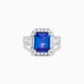 The Effy Hematian 18K White Gold Tanzanite and Diamond Halo Cocktail Ring is shown from the front, featuring an emerald-cut blue tanzanite with a diamond halo and diamond-accented band against a white background.
