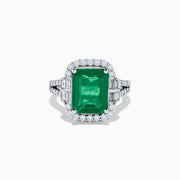 The Effy Hematian 14K White Gold Emerald and Diamond Cocktail Ring showcases a rectangular emerald surrounded by round and baguette diamonds on a sleek white gold band, displayed against a white background.