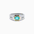 A mens 18K two tone GIA certified Paraiba and diamond ring featuring an oval Paraiba gemstone in a gold setting, accented by three diamonds on each side, displayed on a white background.