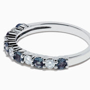 The Effy Hematian 14K White Gold Alexandrite and Diamond 11-Stone Ring showcases alternating green alexandrite and white diamonds along the band, set against a plain white background.