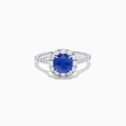 The Effy Hematian 18K White Gold Purple Sapphire and Diamond Halo Ring features a stunning round purple sapphire at the center, surrounded by sparkling diamonds with additional diamond accents along the band.