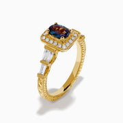 The 18K Yellow Gold GIA Certified Alexandrite and Diamond Halo Ring features a rectangular, iridescent center stone with a diamond halo and diamonds on the band, shown against a white background.