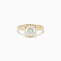 The Lab Grown Diamond 2.00ct Hexagon Solitaire Ring in 14K Yellow Gold showcases a hexagon-shaped, lab grown diamond with a geometric stepped cut, set on a sleek, polished gold band and displayed against a white background.