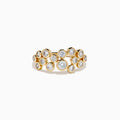 The D'Oro 14K Yellow Gold Bezel Set Diamond Band features two staggered rows of bezel-set round white diamonds in an open, airy design, shown against a white background.