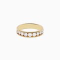 The 14K Yellow Gold 10-Stone Channel Set Diamond Band, 1.00 TCW, features a row of round diamonds channel set around the band and is displayed on a plain white background.