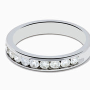 The 14K White Gold 10-Stone Channel Set Diamond Band, 0.50 TCW features a row of sparkling round diamonds set in white gold, shown against a plain white background.