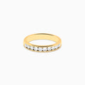 The 14K Yellow Gold 10-Stone Channel Set Diamond Band, 0.50 TCW, features a row of round white diamonds set along the band and is displayed on a plain white background.