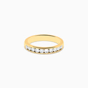 The 14K Yellow Gold 10-Stone Channel Set Diamond Band, 0.50 TCW, features a row of round white diamonds set along the band and is displayed on a plain white background.