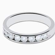 The 14K White Gold 10-Stone Channel Set Diamond Band, 0.75 TCW, features a row of round diamonds in a classic channel setting and is displayed on a plain white background.