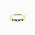 The 14K Yellow Gold 7-Stone Emerald & Diamond Band, 0.25 TCW, features alternating round white diamonds and emeralds set in a row on the band, shown against a white background.
