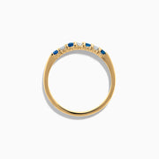 The 14K Yellow Gold 7-Stone Blue Sapphire & Diamond Band (0.25 TCW) features alternating blue sapphires and diamonds set in a row on the band, shown against a plain white background.