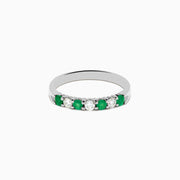 The 14K White Gold 7-Stone Emerald & Diamond Band, 0.50 TCW, showcases alternating round green emeralds and white diamonds on a plain white background.