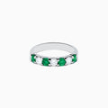 This 14K White Gold 7-Stone Emerald & Diamond Band, 1.00 TCW, features alternating round emeralds and sparkling white diamonds set in a sleek silver band.