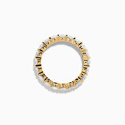 The 14K Yellow Gold Prong Set Diamond Eternity Band, 3.00 TCW, features round white diamonds encircling the entire ring and is shown against a plain white background.