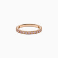 The 18K Rose Gold Pink Diamond Pavé Band Ring showcases a row of sparkling pink diamonds set along the band, photographed on a plain white background.