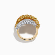 The Canare 14K Yellow Gold White and Yellow Diamond Statement Ring showcases two overlapping bands—one with white diamonds, one with yellow diamonds—in a textured pavé setting on radiant yellow gold.